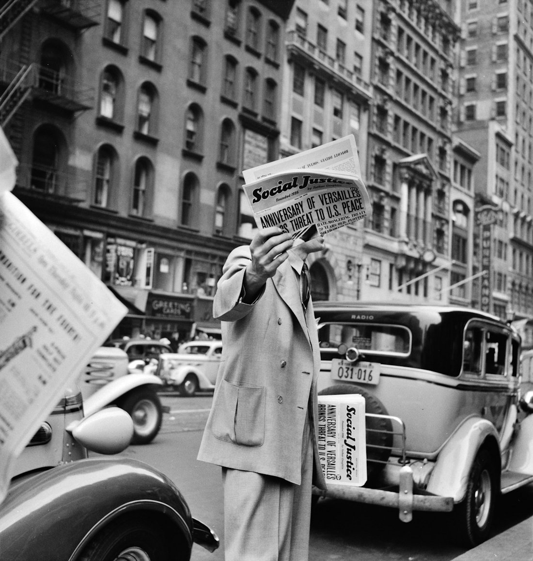 Social Justice newspaper sold on a street corner in New York City in 1939.