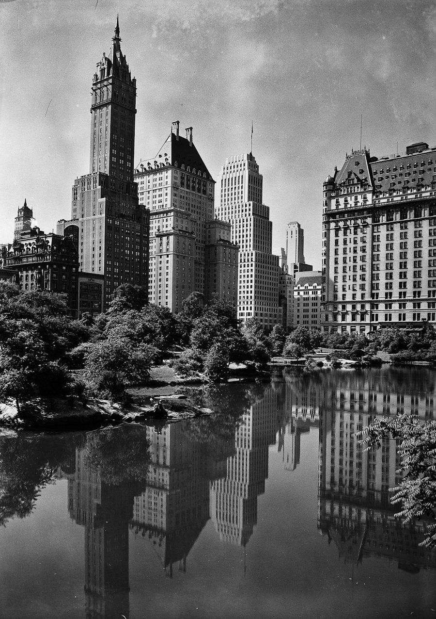 New York skyscrapers reflected in park lake, 1933.