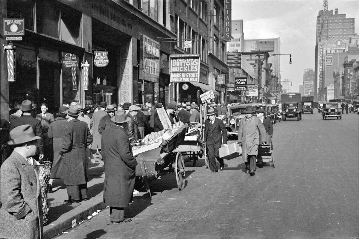 Crowded street scene in 1936 New York City
