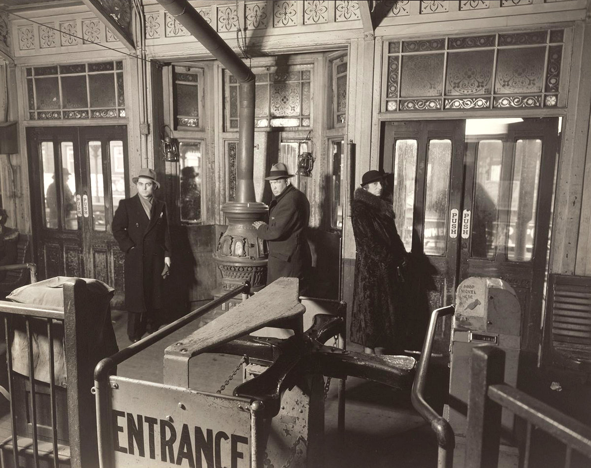 Commuters waiting for the elevated train in New York City, 1936